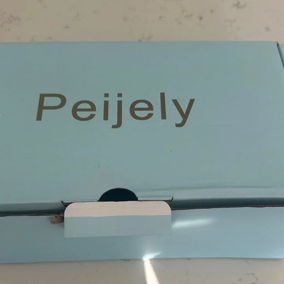 Elegant Cream Heels with Rhinestone Accents - Picture 9 of 9